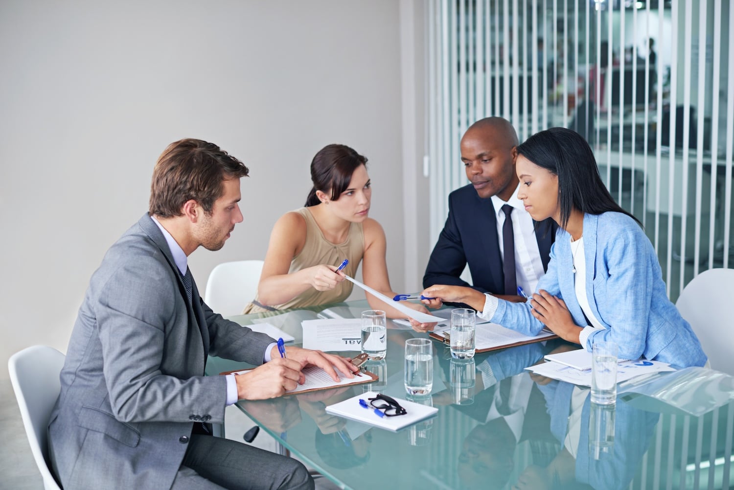 the-business-strategists-shot-of-a-group-of-business people the-business-strategists-shot-of-a-group-of-business people