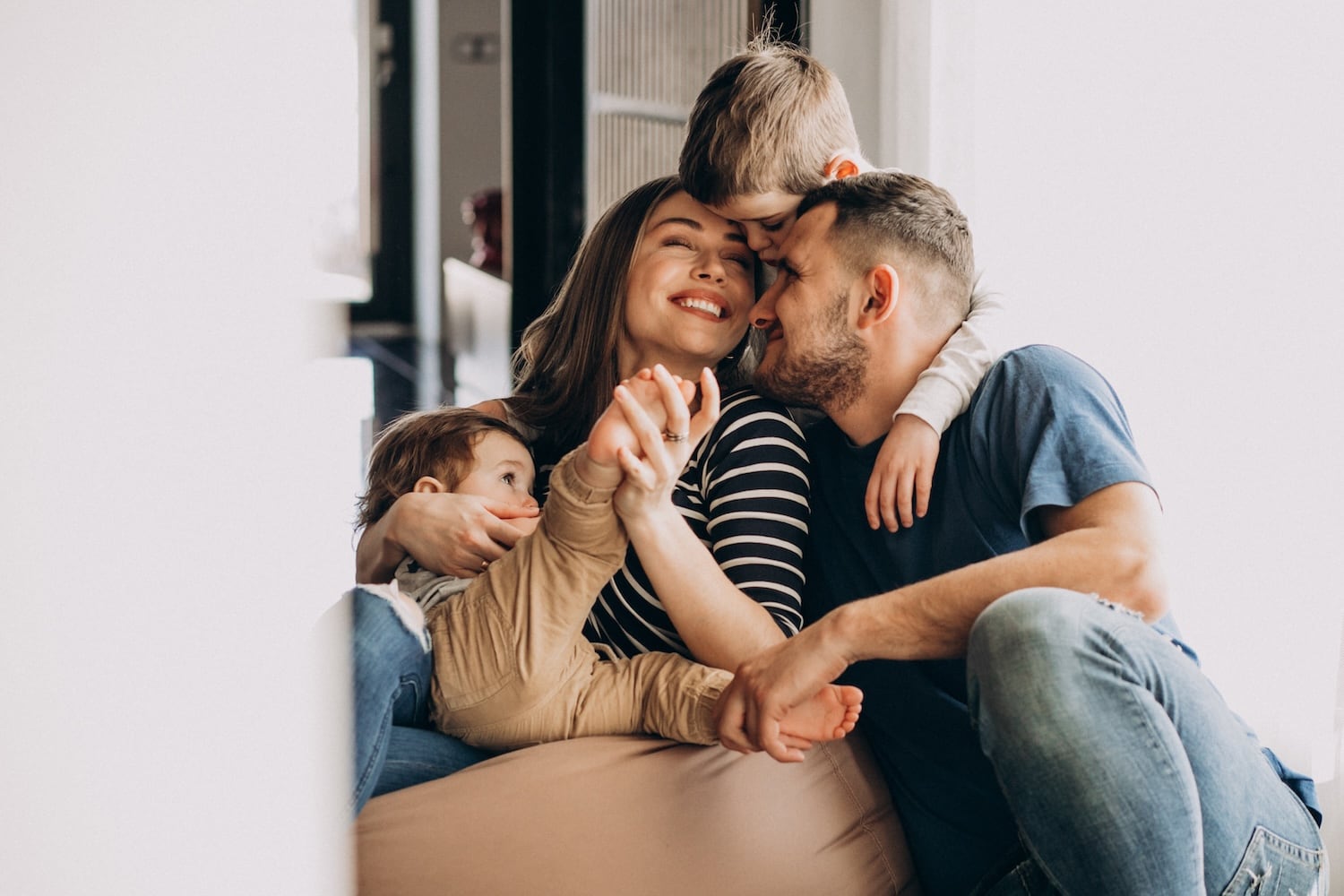young-family-with-their-sons-home-having-fun young-family-with-their-sons-home-having-fun